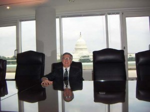 Don sitting in a client's boardroom overlooking the Capital